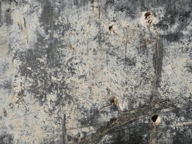 Beton duvarın pürüzlü dokusu, gri, kahverengi ve beyaz soyut arkaplan.