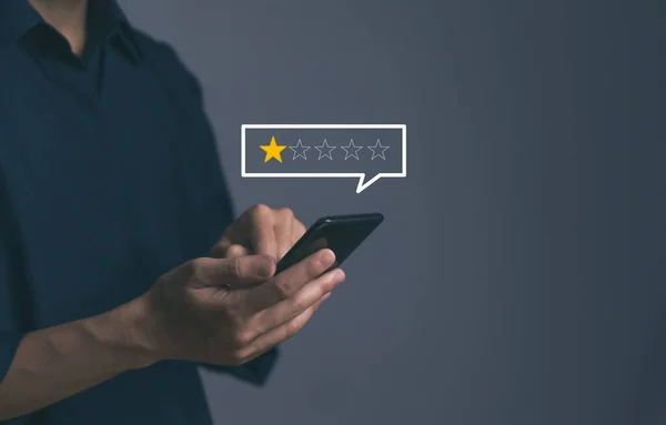 Customer Review Experience Dissatisfied Selection of 1-star rating reviews on smartphone screens. negative feedback concept Unhappy businessman, poor service, or poor quality.