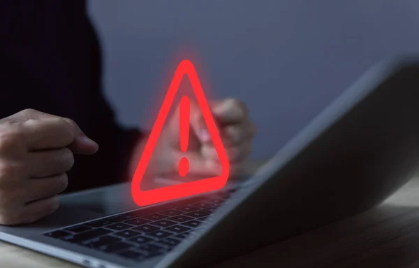 Businessman Using Laptop Showing Warning Triangle Exclamation Sign Icon Warning — Zdjęcie stockowe