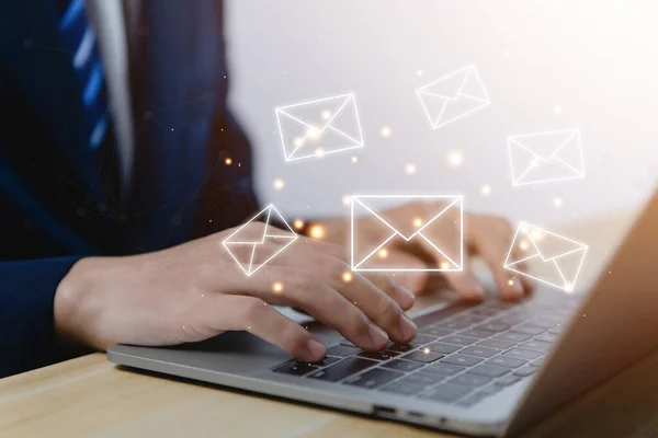 stock image Businessman sending a letter from a computer. electronic mail concept is online communication on the Internet network Receiving and sending information or messages in digital technology