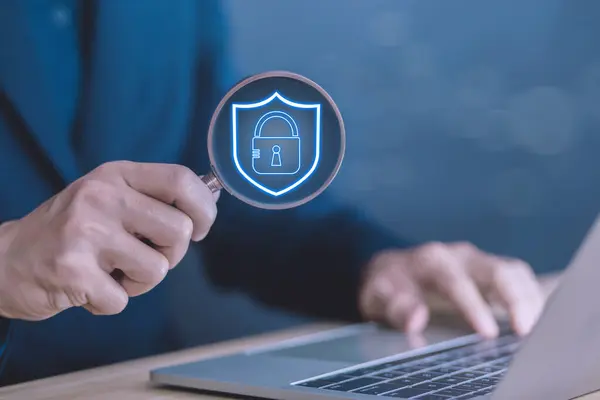 a shield lock icon is secure cyber technology in a laptop. concept of fraud, privacy data protection, and safe information business. prevent system network security in Internet digital