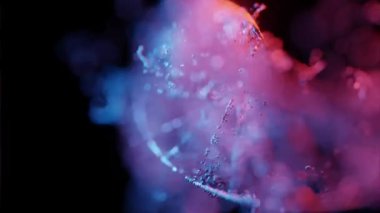Bokeh etkisi ve parçacıkları olan mavi ve pembe bir arkaplan
