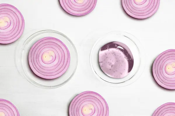 Onion Slices. Beauty treatments and body care with onion. Cream and onion pieces on a white background, beauty.