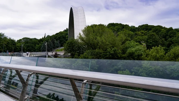 stock image The pedestrian and bicycle bridge is a metal three-span girder bridge with a length of 212 meters, erected in the central part of Kyiv.