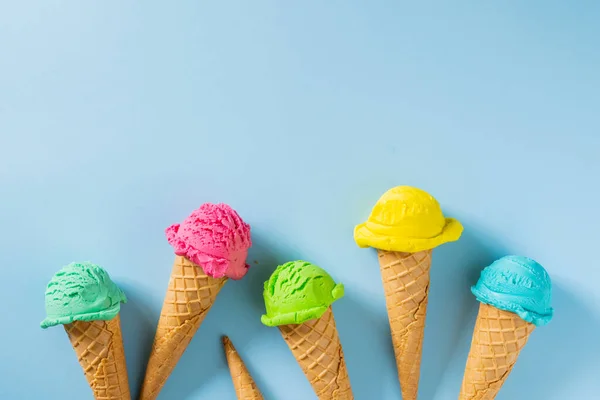 Colorful Ice Cream Scoops Cones Bright Blue Background Top View — Stockfoto