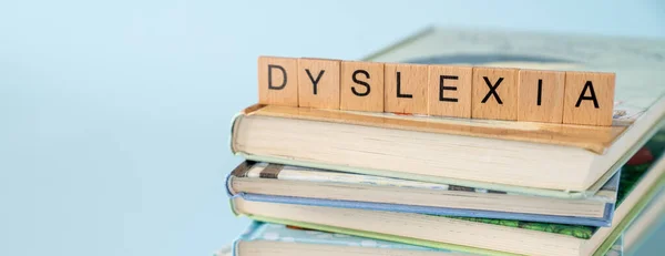 Dyslexia Concept Name Disorder Books Blue Background High Quality Photo — Stock Photo, Image