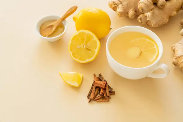 Ginger tea and ingredients - lemon, ginger, honey, copy space