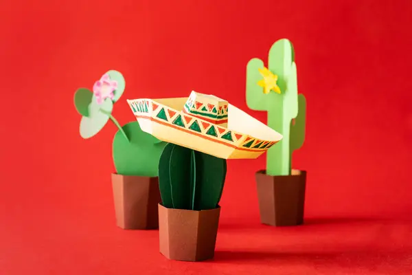 Cinco Mayo Concept Paper Craft Cactus Sombrero Solid Color Background Stock Photo