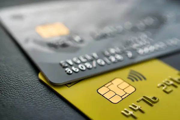Close-up shot of a debit or credit plastic cards with a chip.