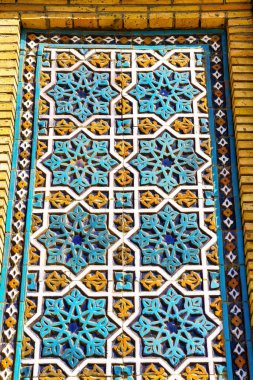 Geometric traditional Islamic ornament. Fragment of a ceramic mosaic.Abstract background.