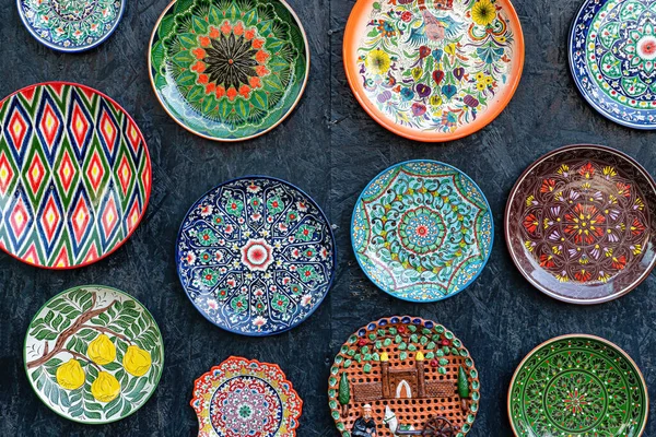 stock image Arabic painted ceramic plates hanging on the wall.