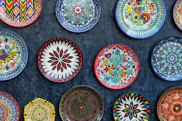 stock image Arabic painted ceramic plates hanging on the wall.