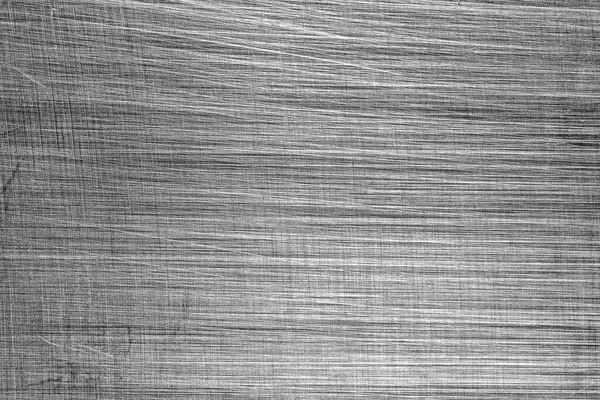 stock image Monochrome texture of shiny scratched metal. Abstract background for design.