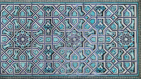 Geometric traditional Islamic ornament. Fragment of a ceramic mosaic.Abstract background.