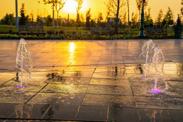 Small Fountains Sidewalk Illuminated Sunlight Sunset Sunrise Park Summertime — Stock Photo, Image