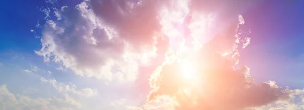 stock image Sunbeams breaking through dramatic cumulus clouds. Weather change from stormy to sunny. Hope or religion concept.