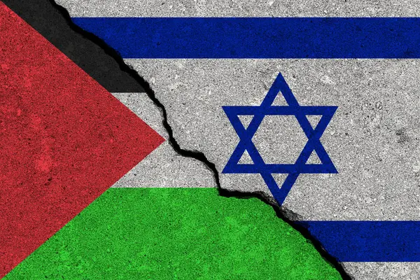 stock image The crack between the Palestine and Israel flags on the concrete wall. The concept of sanctions, war, the deterioration of diplomatic relations, confrontation and severance of agreements.