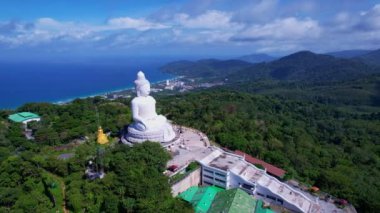 White Marble Big Buddha Statue Temple. Close Up Aerial View big buddha on top of mountains at Phuket Thailand