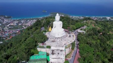 White Marble Big Buddha Statue Temple. Close Up Aerial View big buddha on top of mountains at Phuket Thailand