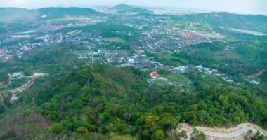 Aerial hyperlapse (timelapse) of Shadow clouds over mountain city of Kathu city Phuket Thailand, Clouds over the mountains peak