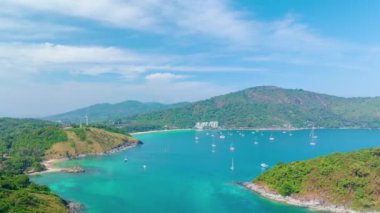 Aerial view Hyperlapse Phuket sea in summer season. Amazing sea beach with ocean waves foams. Beautiful nature seascape of sea surface, Concept holiday summer Travel destination,Nature background