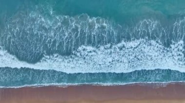 Sea waves crashing on sandy shore water surface,Amazing waves sea nature