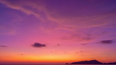 Time lapse of Majestic sunset light sky over sea landscape,Amazing light of nature cloudscape sky