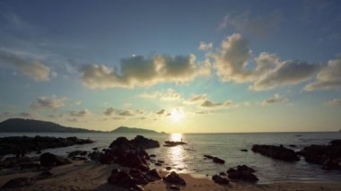 Colorful sunset or sunrise above the sea surface,Clouds over open sea,Reflected sun beautiful light of nature on water surface,Sunset over ocean,Sea summer and travel vacation concept