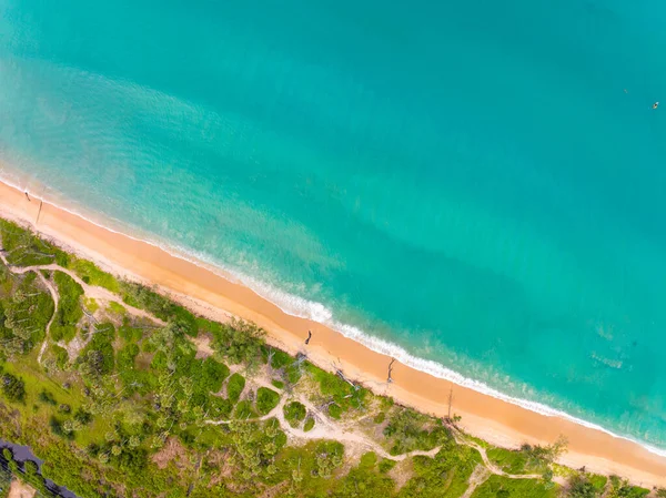 stock image Bird eye view seashore with wave crashing on sandy shore. Beautiful waves sea surface in sunny day summer background, Amazing seascape top view seacoast landscape view