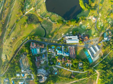 Aerial view drone shot of beautiful green golf field at Phuket island Thailand,Wide angle Top view golf course