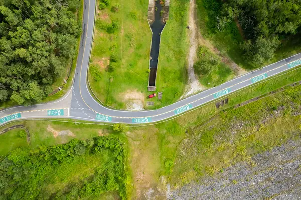 stock image Aerial view Curve road top view rainforest trees summer background