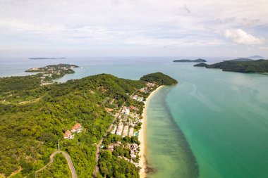 Aerial view of a blue sea surface water texture background,Sun reflections over ocean, Aerial flying drone view Waves water surface texture on sunny tropical ocean in Phuket island Thailand