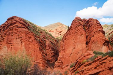 Closeup of red-brown cliffs in Jeti-Oguz gorge clipart