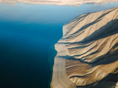 Aerial view of Toktogul water reservoir in Kyrgyzstan clipart