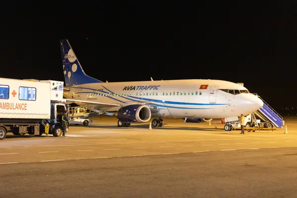 stock image Bishkek, Kyrgyzstan - September 26, 2023: Avia Traffic plane at the Manas International Airport at night