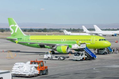 Bishkek, Kyrgyzstan - September 26, 2023: Russian S7 Airlines RA-73422 Airbus A320-214 plane at the Manas International Airport clipart