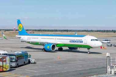 Bishkek, Kyrgyzstan - September 26, 2023: Uzbekistan Airways UK32105 plane Airbus A321-253NX plane at the Manas International Airport clipart