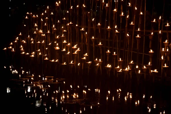 stock image The candlelight reflected on the water surface at night.