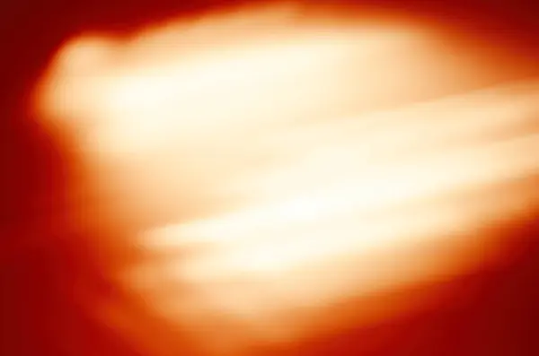 Bulanık ışıkları olan renkli bir arka plan. Bulanık arkaplanı olan soyut hareket ışıkları. Eğilimli odaksız ışıklar.