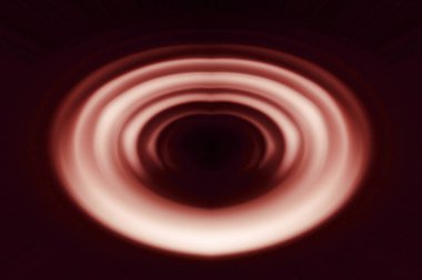 Odaklanamayan renkli ışıklarla soyut bir arkaplan. Parlak bir arkaplanda bulanık şekiller ve çizgiler. Bokeh bulanık ışıklarla soyut kalp şekli.