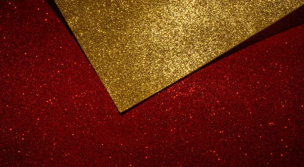 stock image Red and golden glitter making a celebration Christmas background .