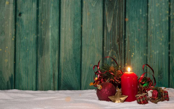 Christmas decoration red candlelight on snow theme wallpaper.