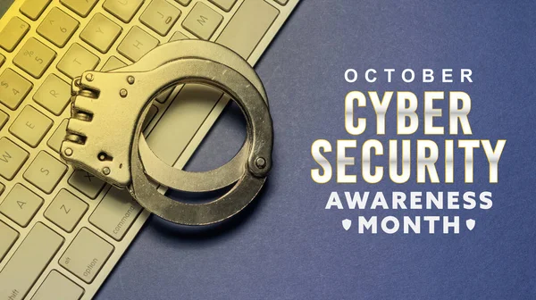 Cyber Security awareness month of October banner with digital computer and handcuff.