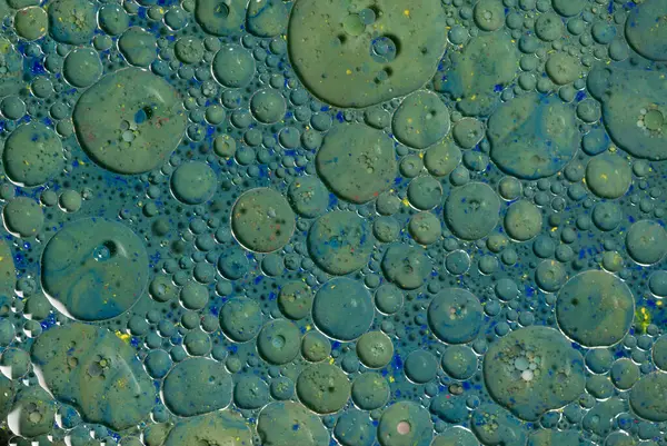 Blaue Und Grüne Kreise Machen Die Oberfläche Des Exoplaneten Wallpaper lizenzfreie Stockfotos