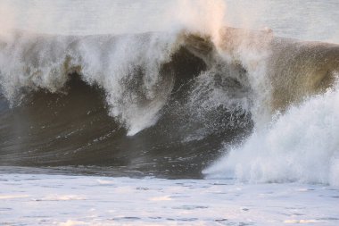 Surfing giant waves in Santa Barbara California