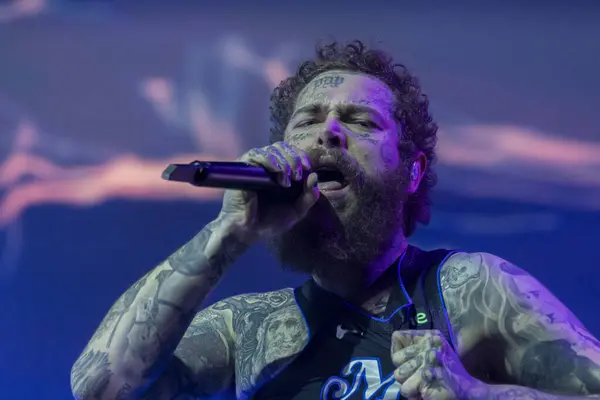 Stock image Post Malone and his band perform at the Bonnaroo music festival