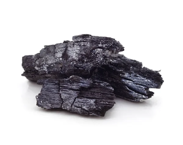 stock image Pile of charcoal isolated on a white background.