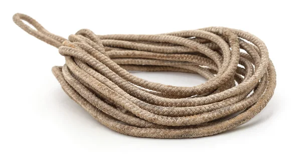 stock image Coiled old rope isolated on white background.