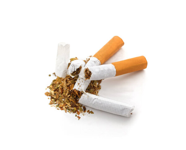 Heap of broken cigarettes isolated on a white background.