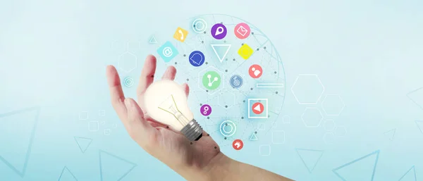 Creative idea light bulb of the hand in childhood and learning to use technology to bring about the advancement of knowledge in future concept on Blue background. copy space, digital -3d Rendering